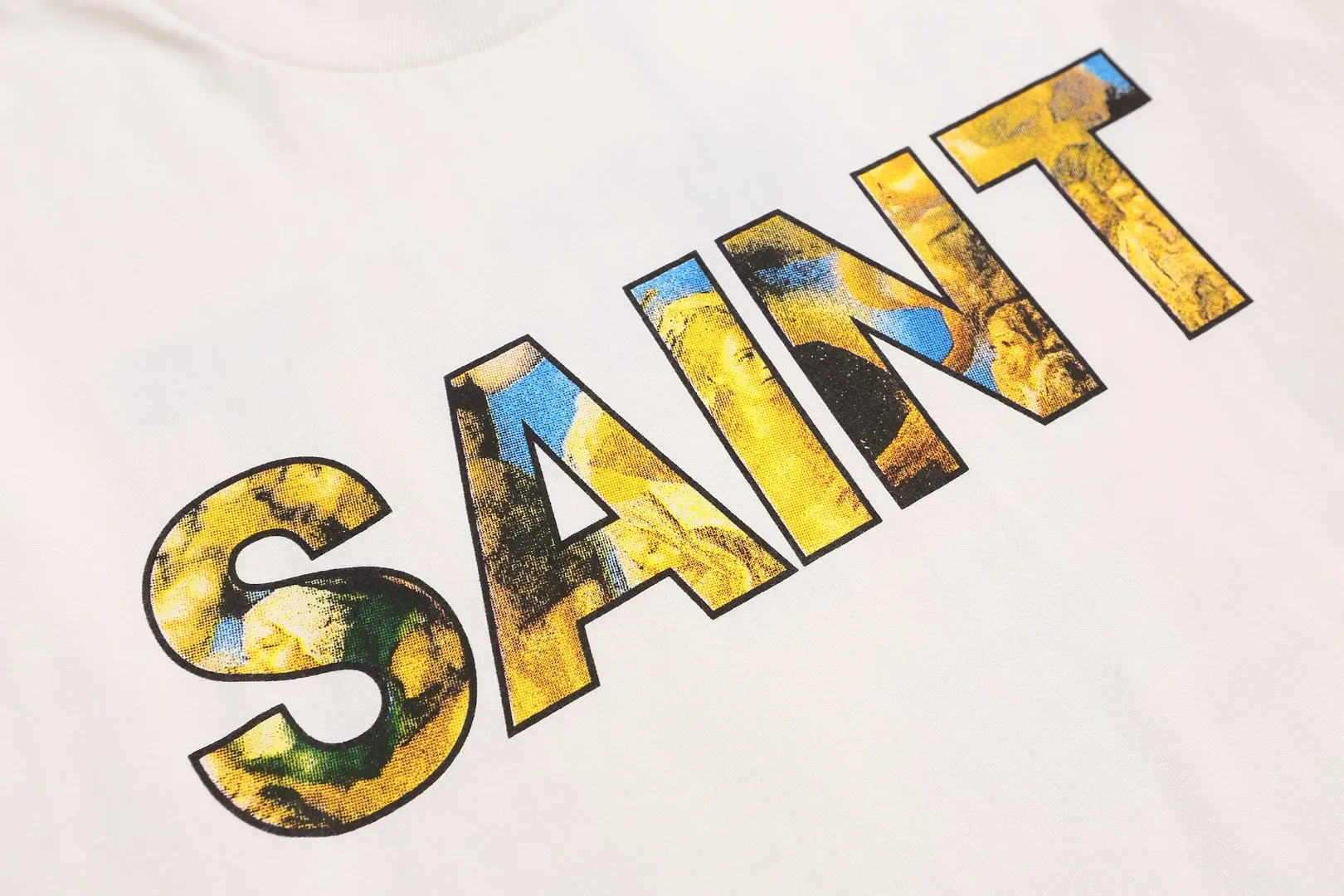 SAINT Michael FW25 vintage distressed round neck long-sleeved T-shirt with oil painting letters printed on the chest for spring and autumn. Fabric: 260g Style number: SM663 Size: S-M-L-XL Color: White Price: P144